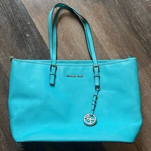 Michael Kors bright blue tote bag